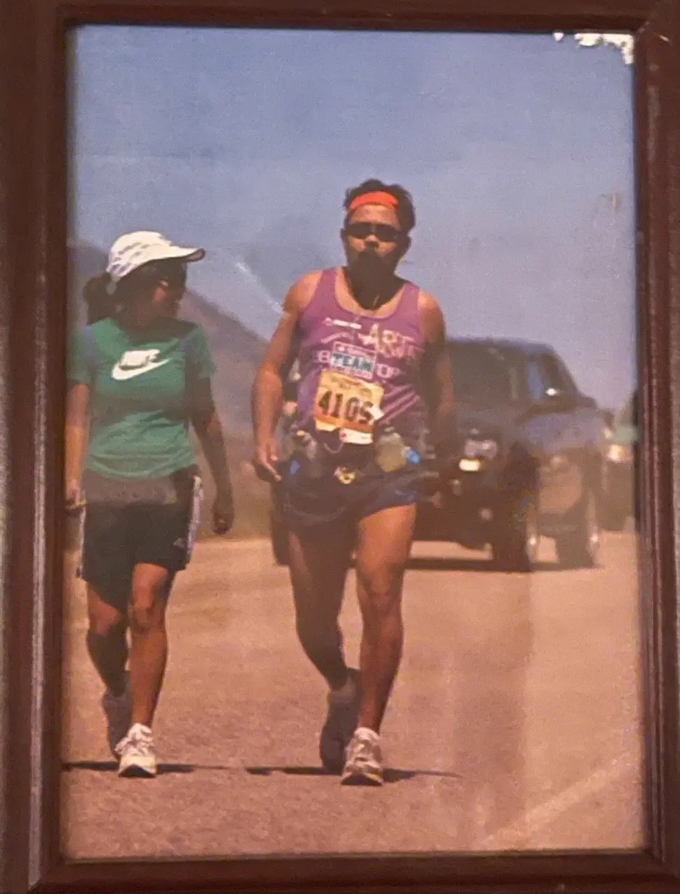 Arjun Sen finishing the 2008 marathon with his daughter beside him