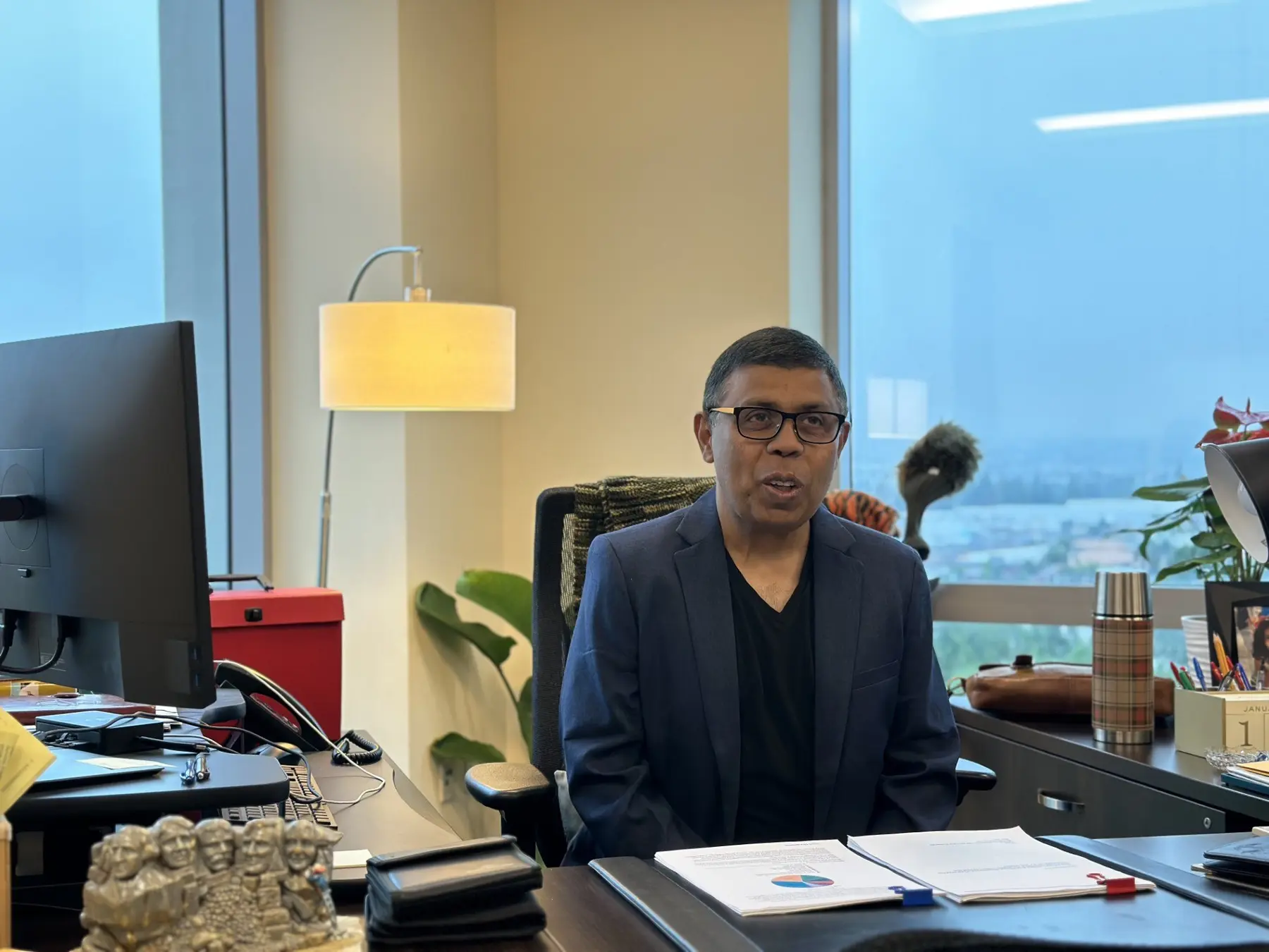 Arjun Sen seated on the office set built for I Want to Talk
